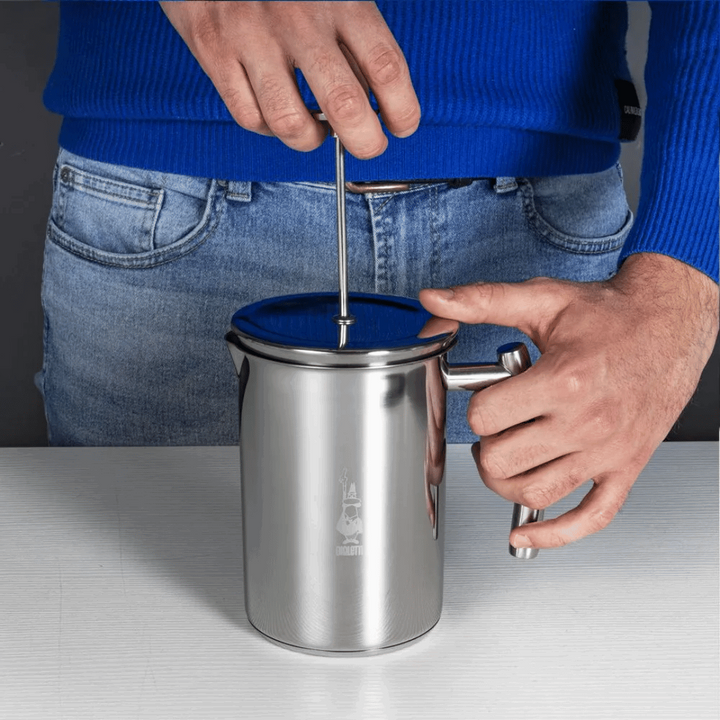 frothing milk with stainless steel milk frother