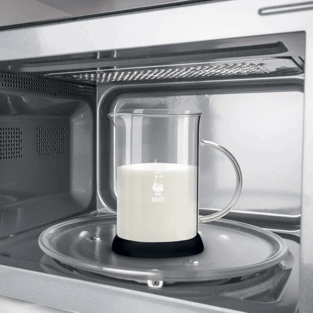 heating milk in glass beaker in microwave for frother